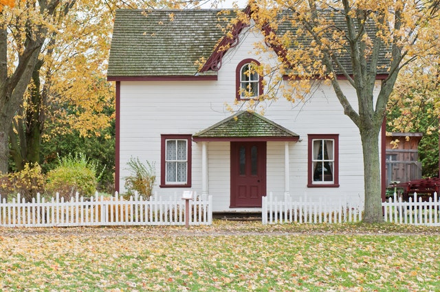 lovely white house in fall