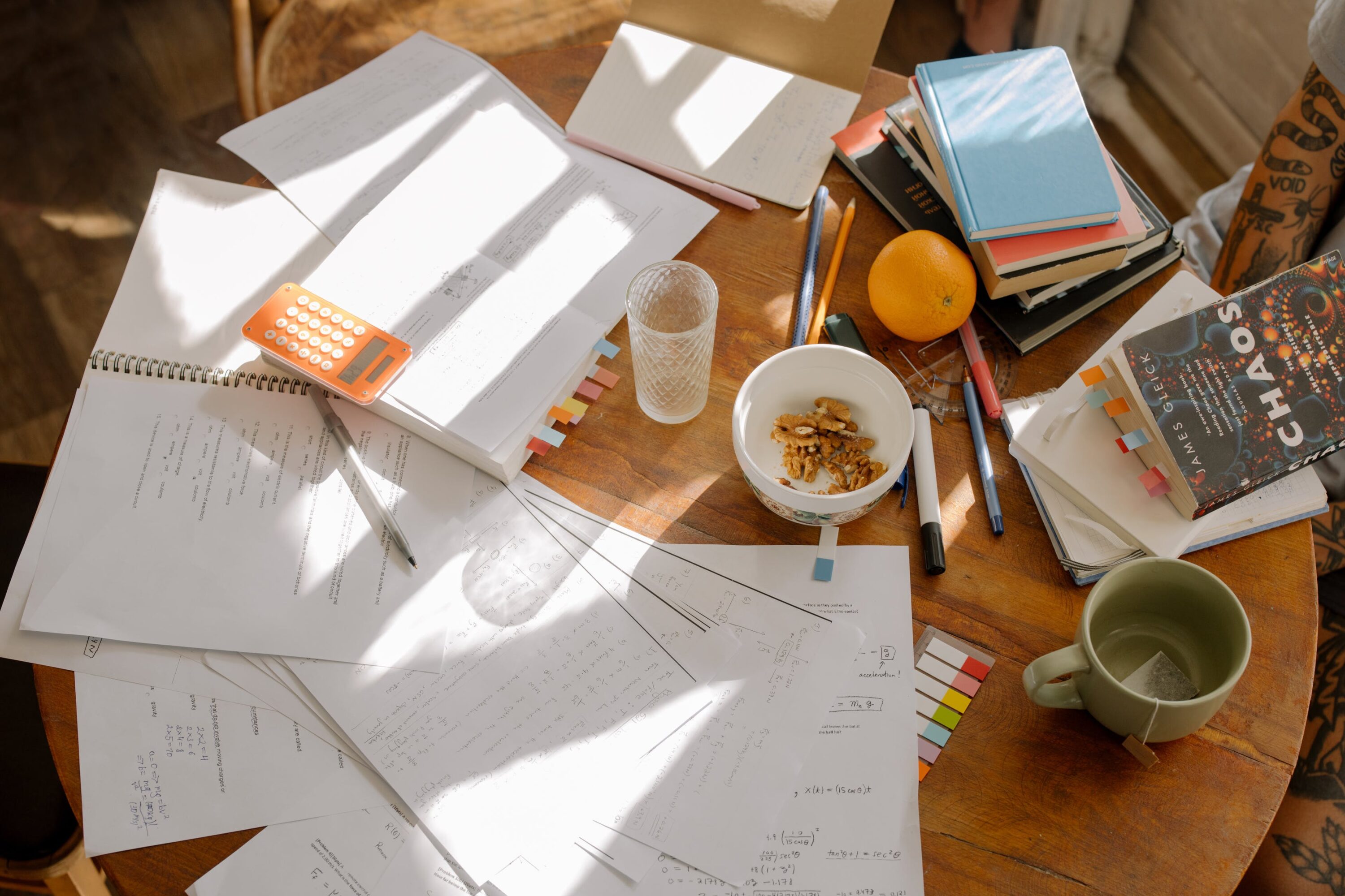 table cluttered with papers